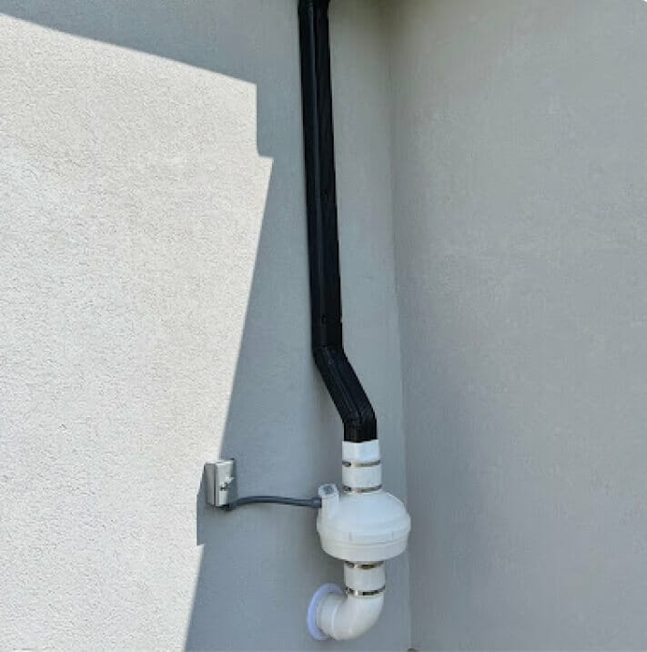 Outdoor radon mitigation system integrated with the home's existing architecture