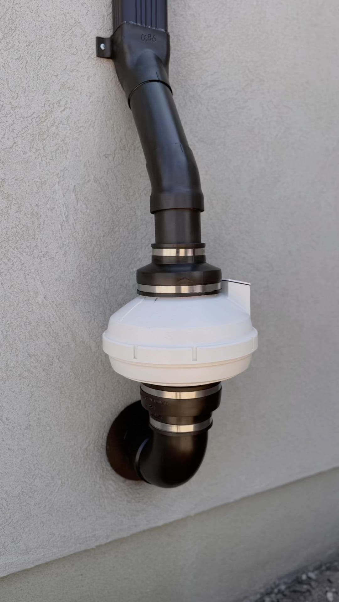 Radon Mitigation System Exhaust Fan on Building Exterior